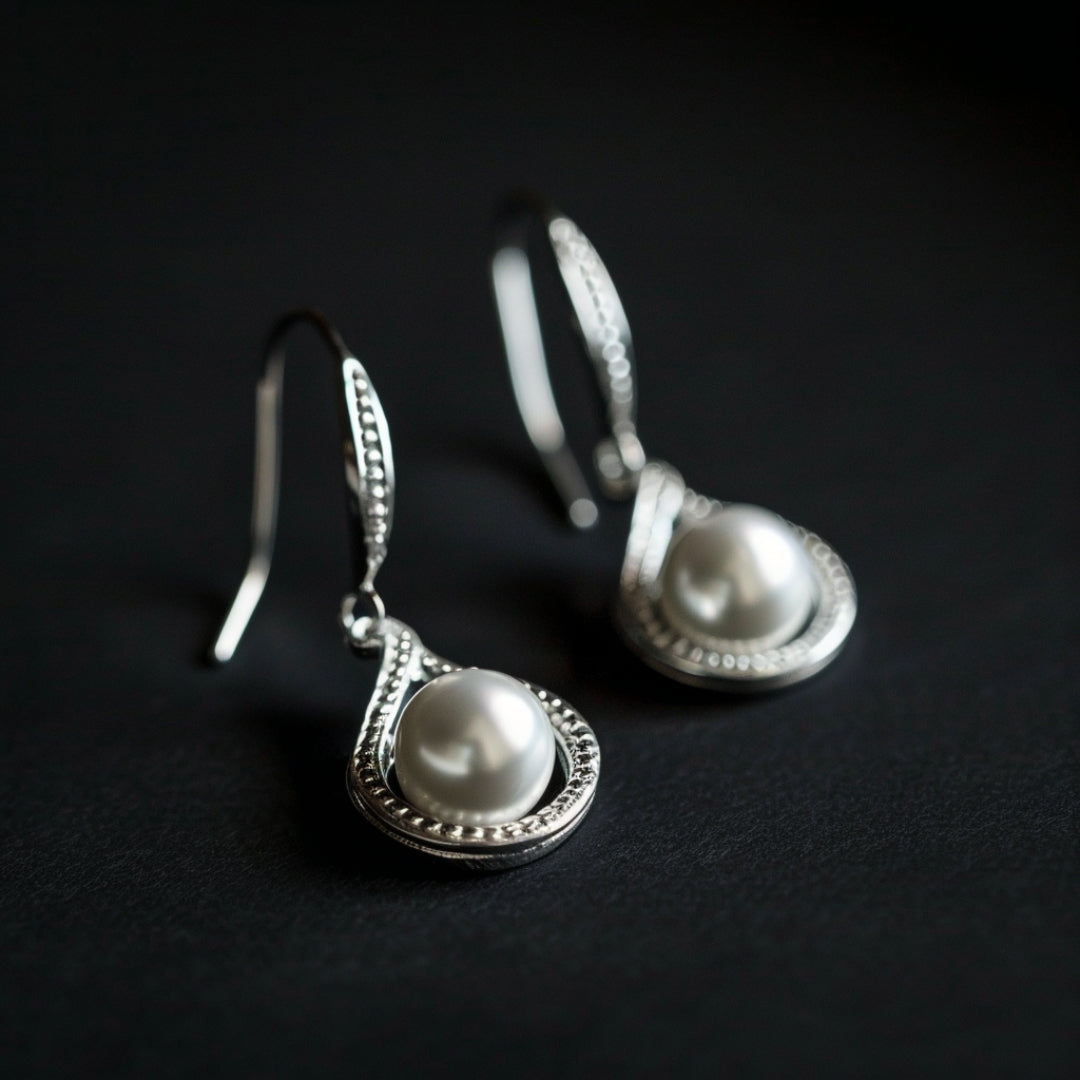 Boucles d'oreilles en argent et perles à chute