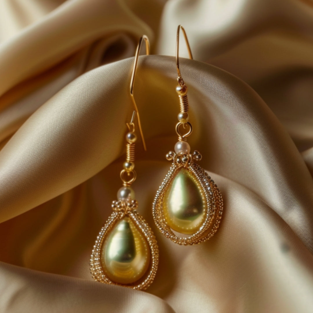Boucles d'oreilles perle goutte d'eau dorée