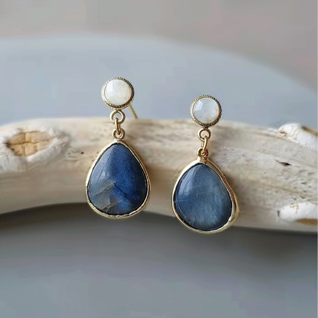 Boucles d'oreilles en perles avec pierre enlaidée bleue