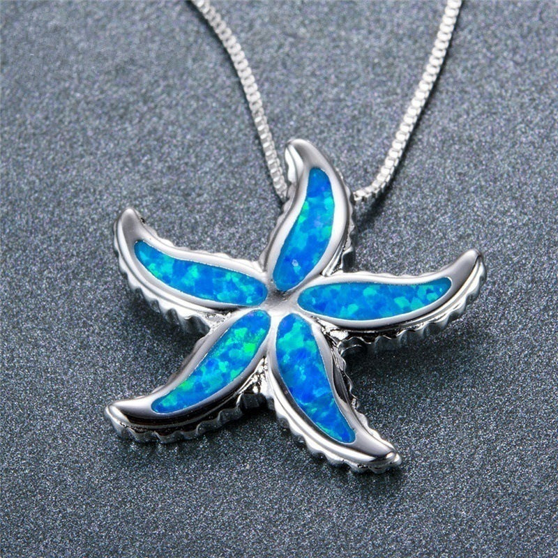 Collier en argent avec étoile de mer bleue brillante et opale
