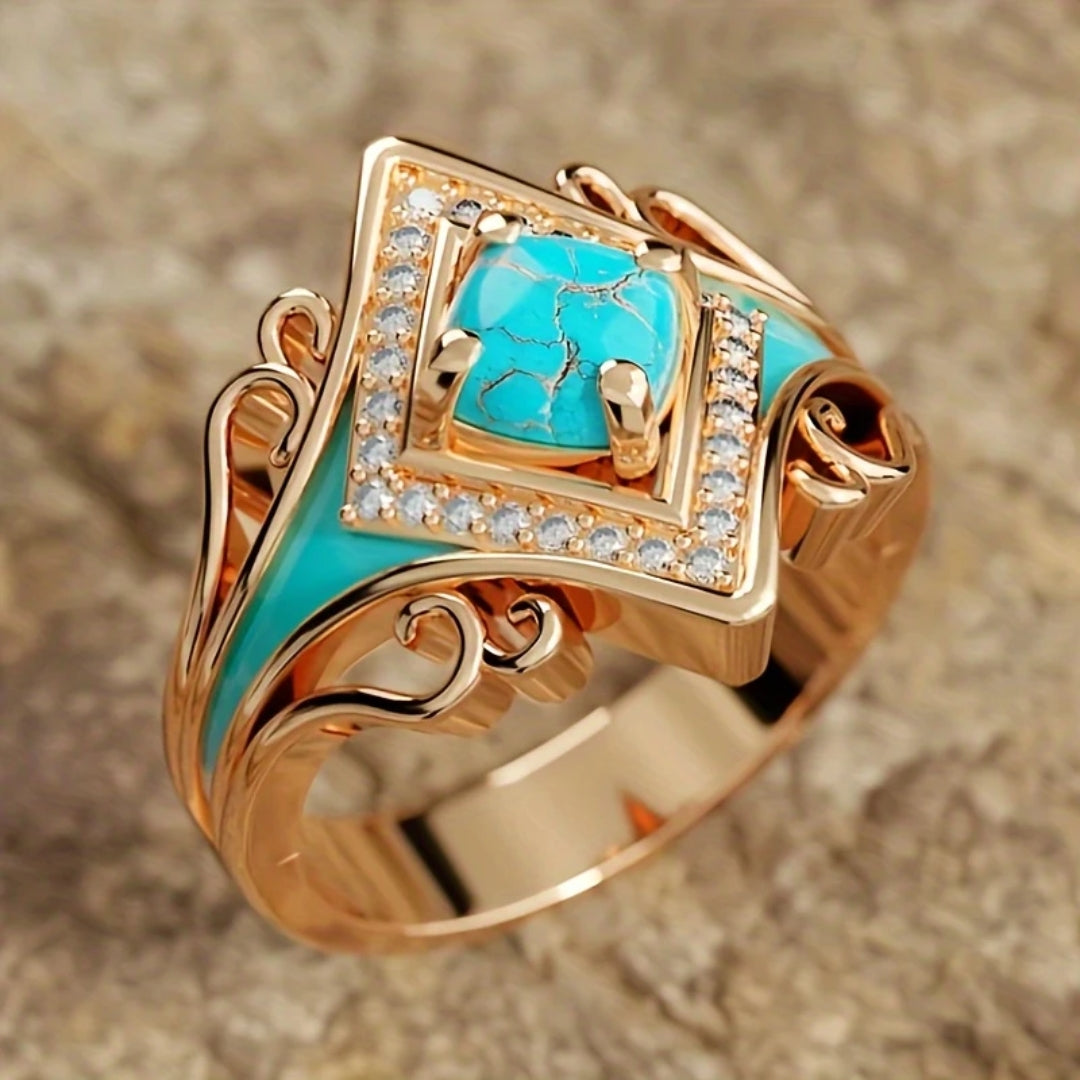 Bague en or et opale bleue avec couronne