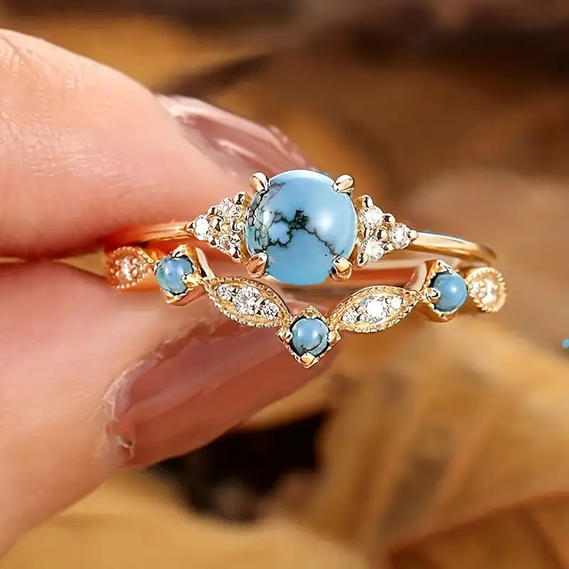 Bague en Opale Bleue et Zirconium Doré