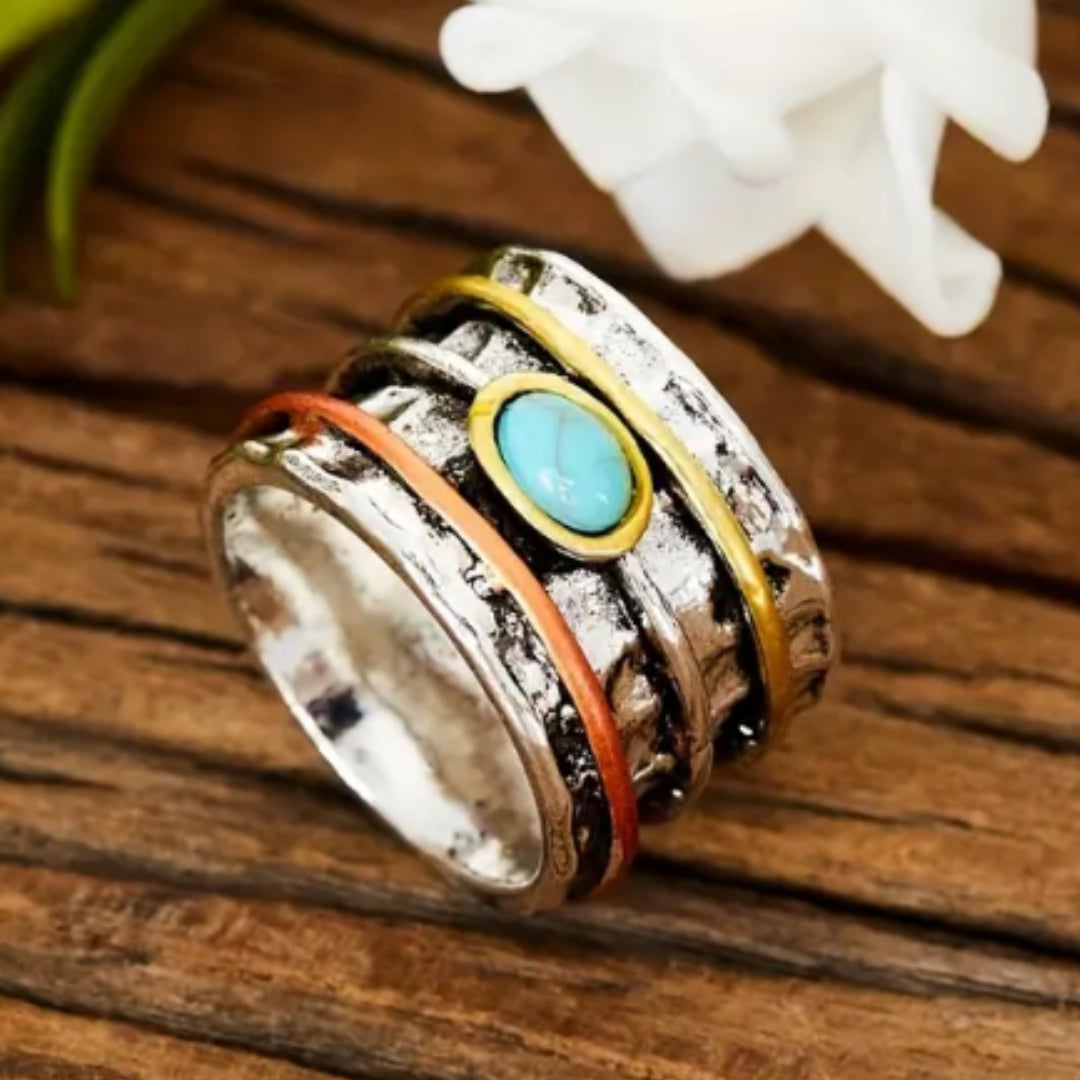 Bague en argent avec pierre bleue