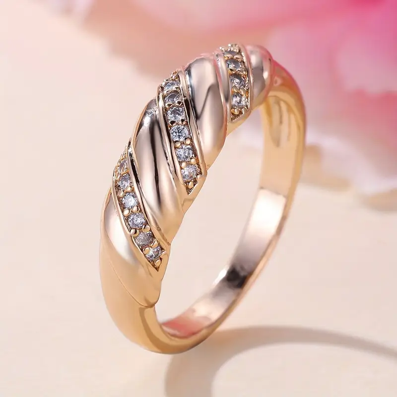Bague en zirconium tressé avec rose