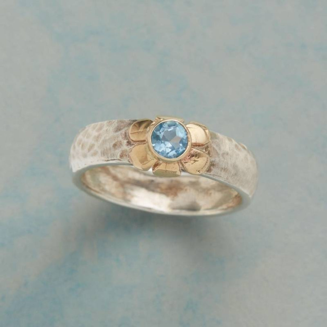 Bague vintage en argent et zirconium bleu avec fleur