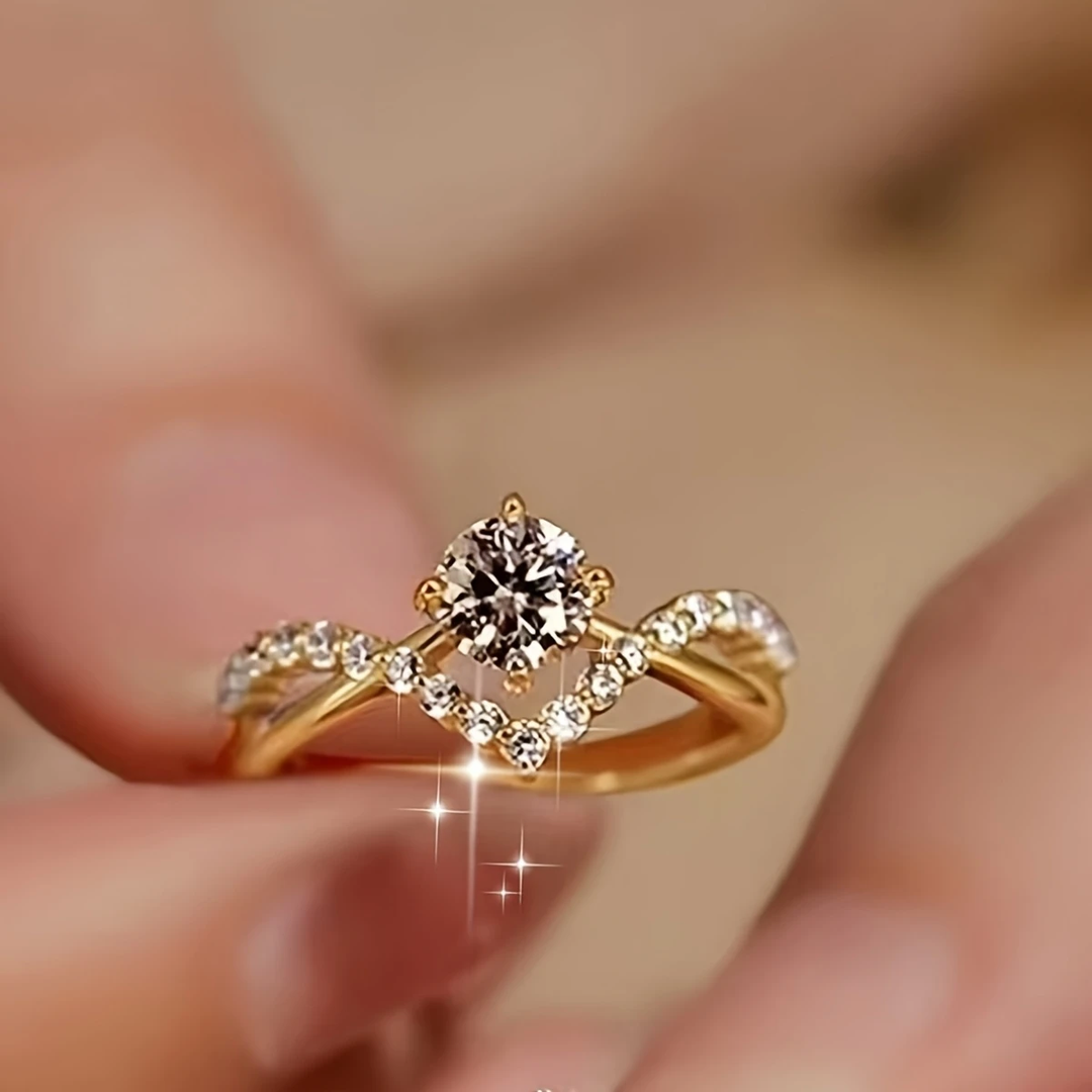 Bague brillante en or couronné