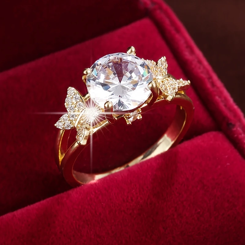 Bague en or avec papillon en cristal