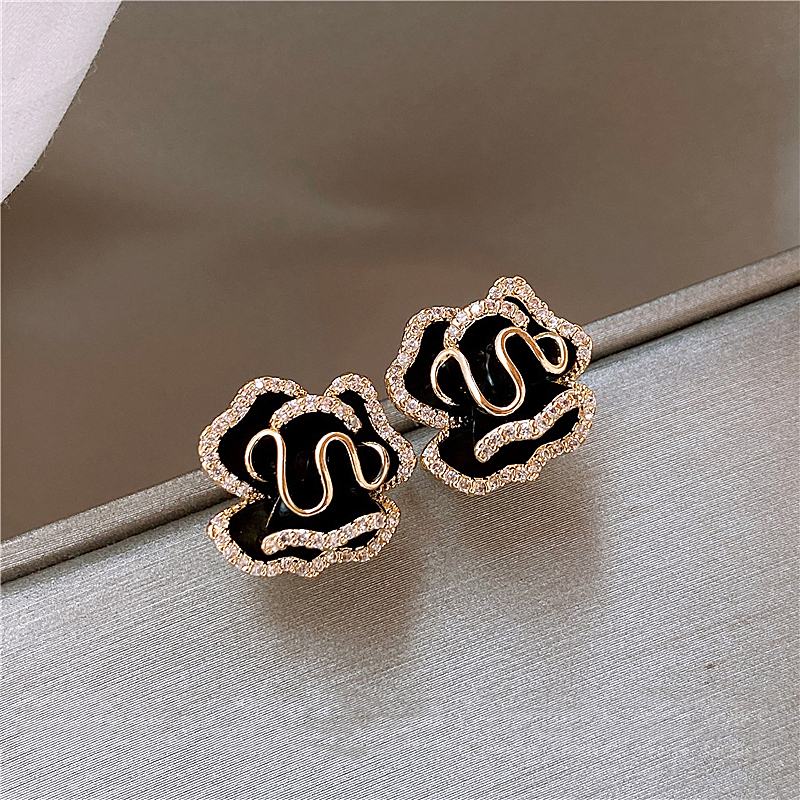 Boucles d'oreilles élégantes en or Lotus noir