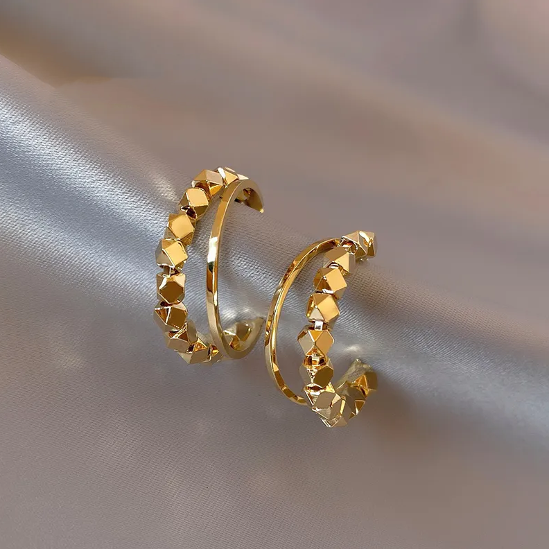 Boucles d'oreilles élégantes en cubic or
