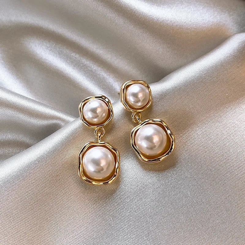 Boucles d'oreilles élégantes à double perle
