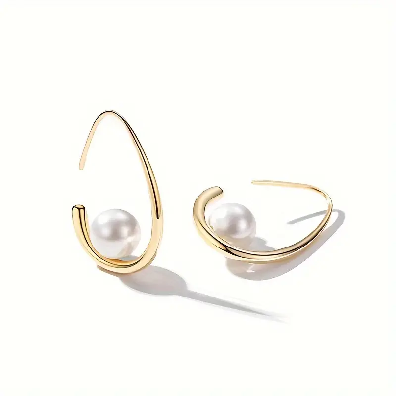 Boucles d'oreilles élégantes en perles et or