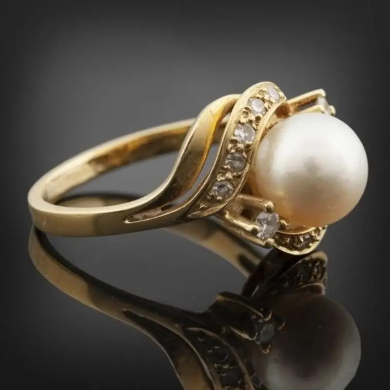 Bague Élégante en Perles et Or