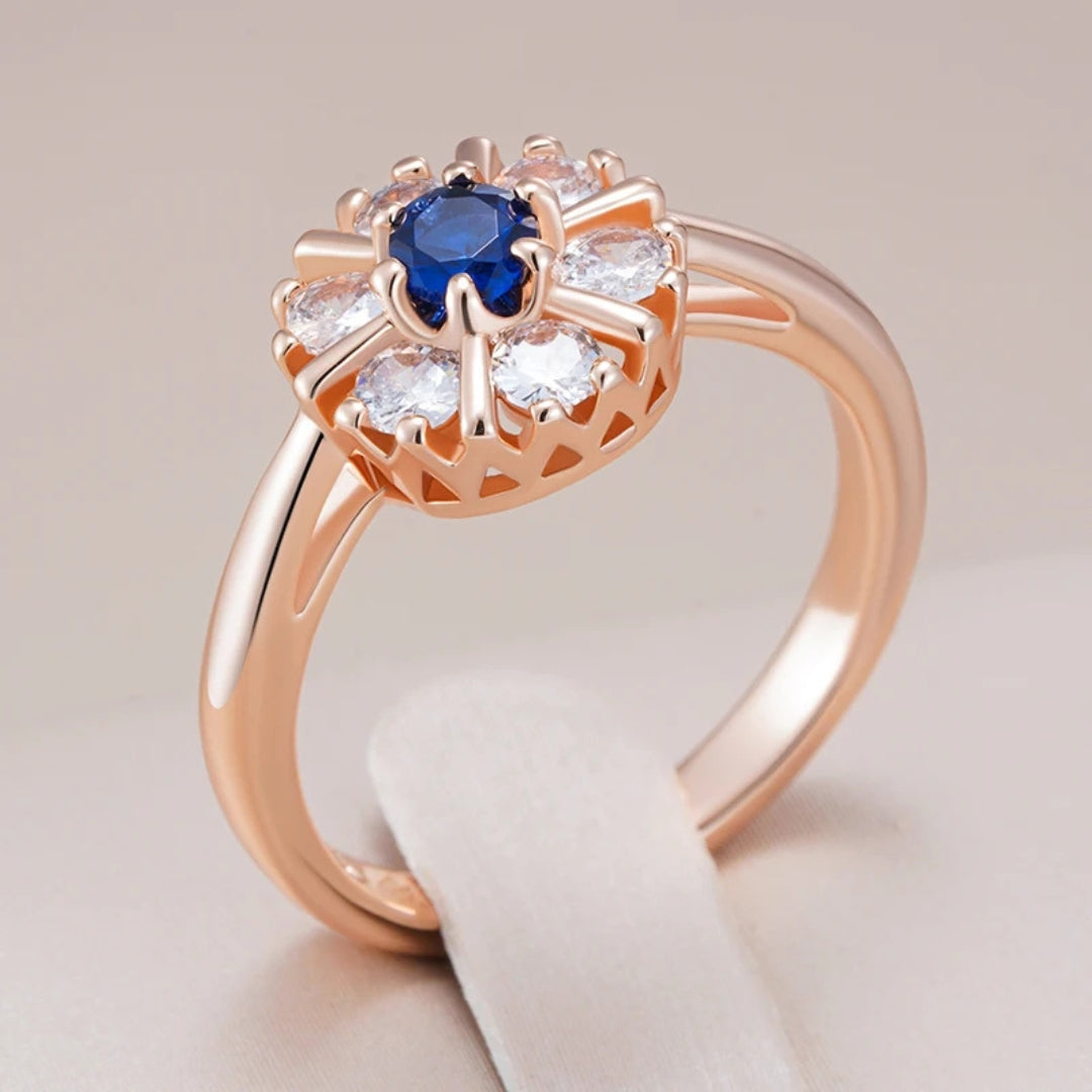 Bague en or élégante avec cristal bleu rond