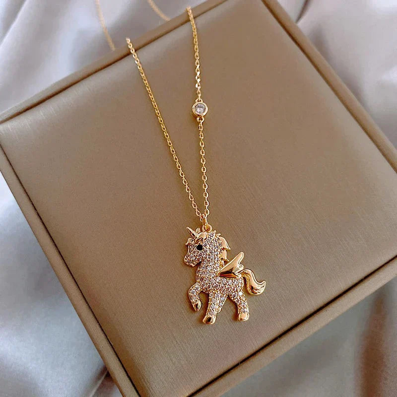 Collier en zirconium avec licorne en or