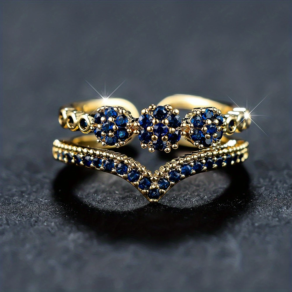 Bague en or avec cristaux bleus incrustés