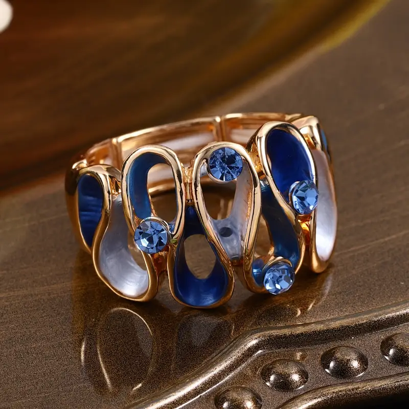 Bague ondulée irrégulière bleue et or