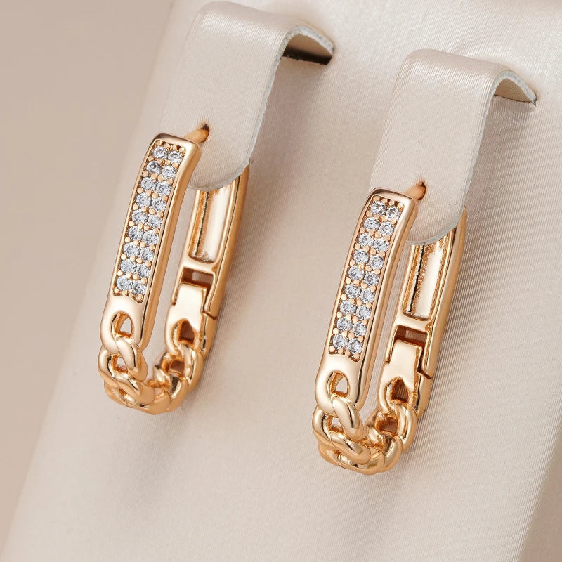 Boucles d'oreilles chaîne en zirconium doré élégante
