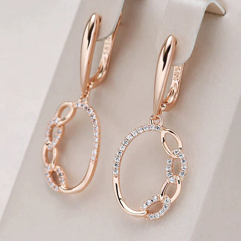 Boucles d'oreilles élégantes avec zirconium or