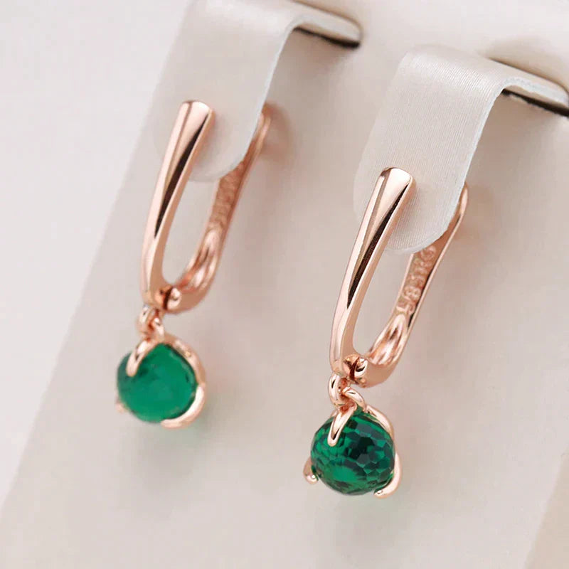 Boucles d'oreilles en cristaux verts élégants en or