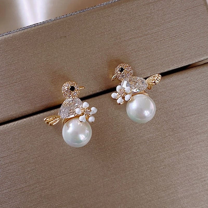 Boucles d'oreilles Birdie de luxe avec zircon cubique et incrustation de perles