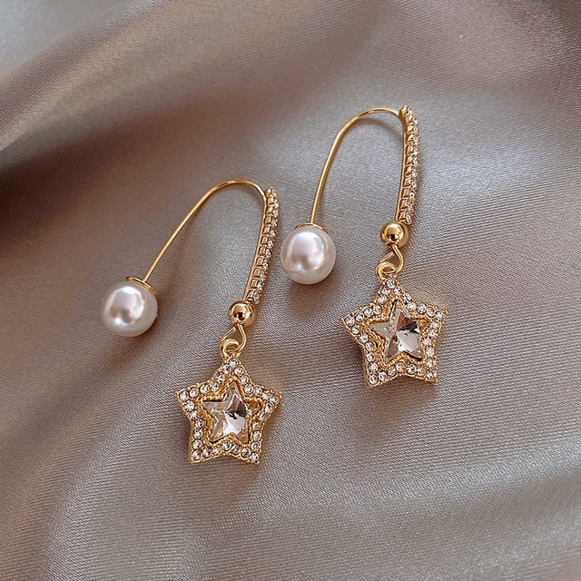 Boucles d'oreilles étoile en cristal avec perles en or