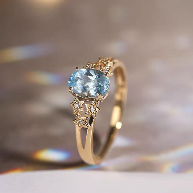 Bague en or avec cristal exotique bleue
