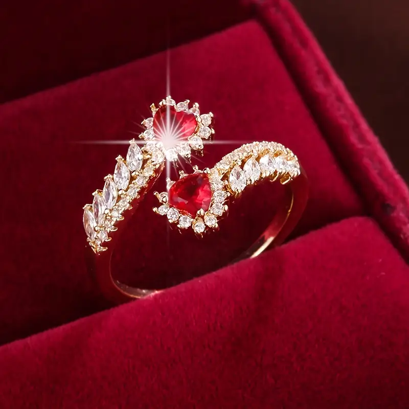 Bague en or avec zircon rouge ouvert