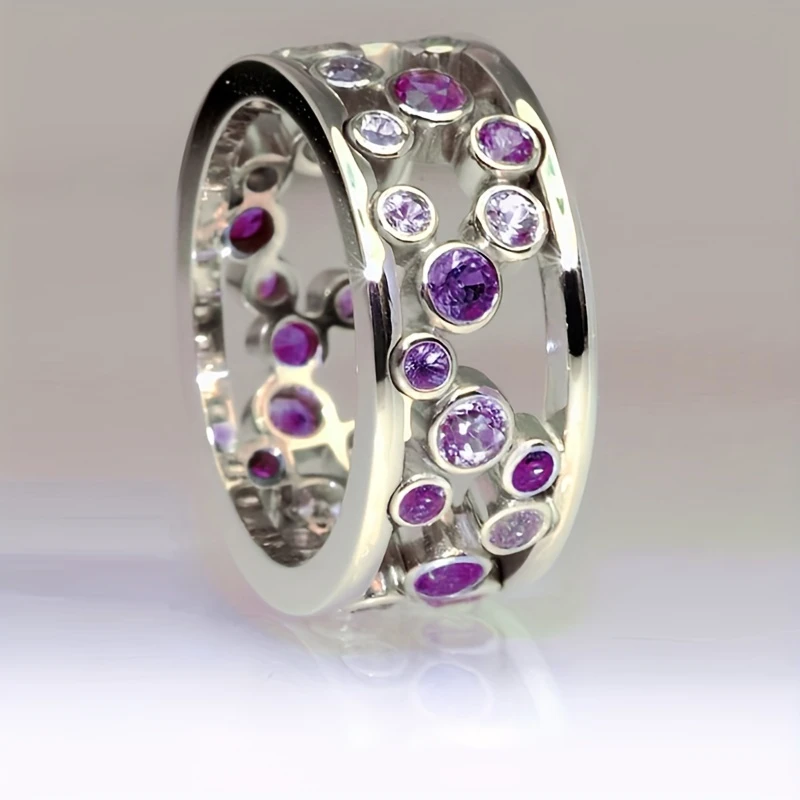 Bague creuse en argent avec cristal incrusté violet