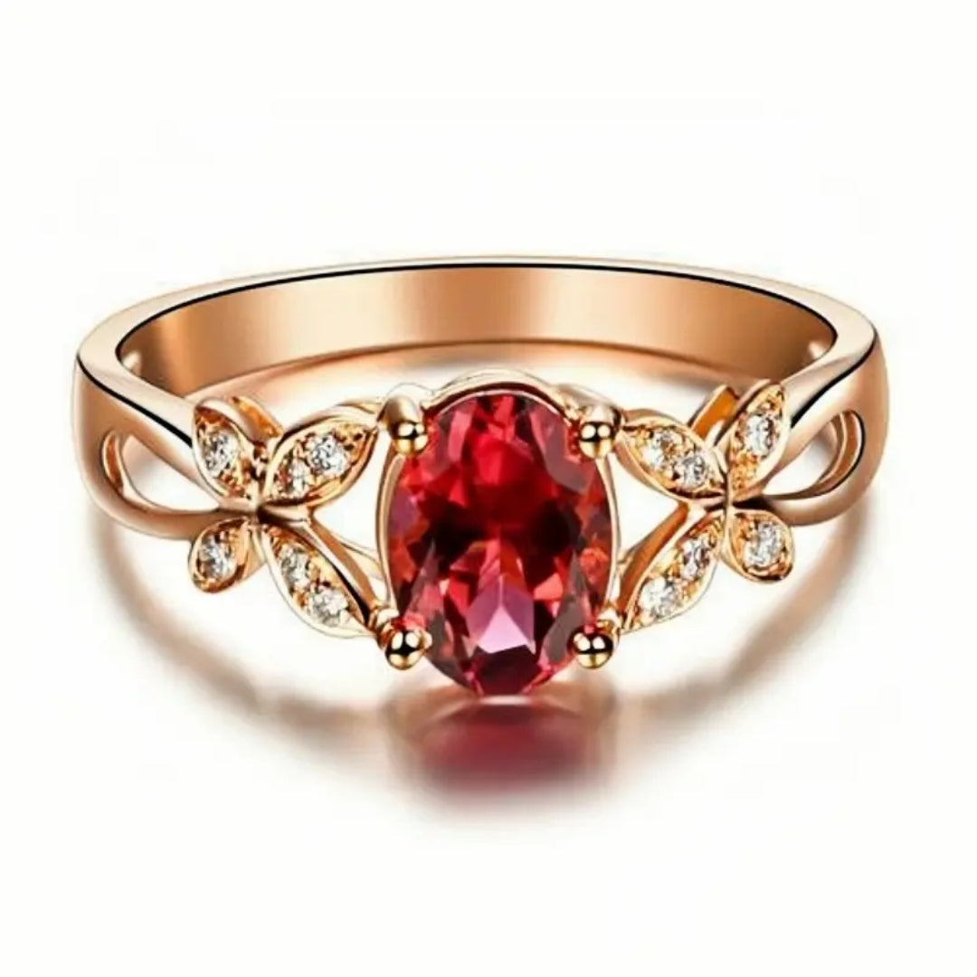 Bague en or avec papillon en zirconium ovale rouge