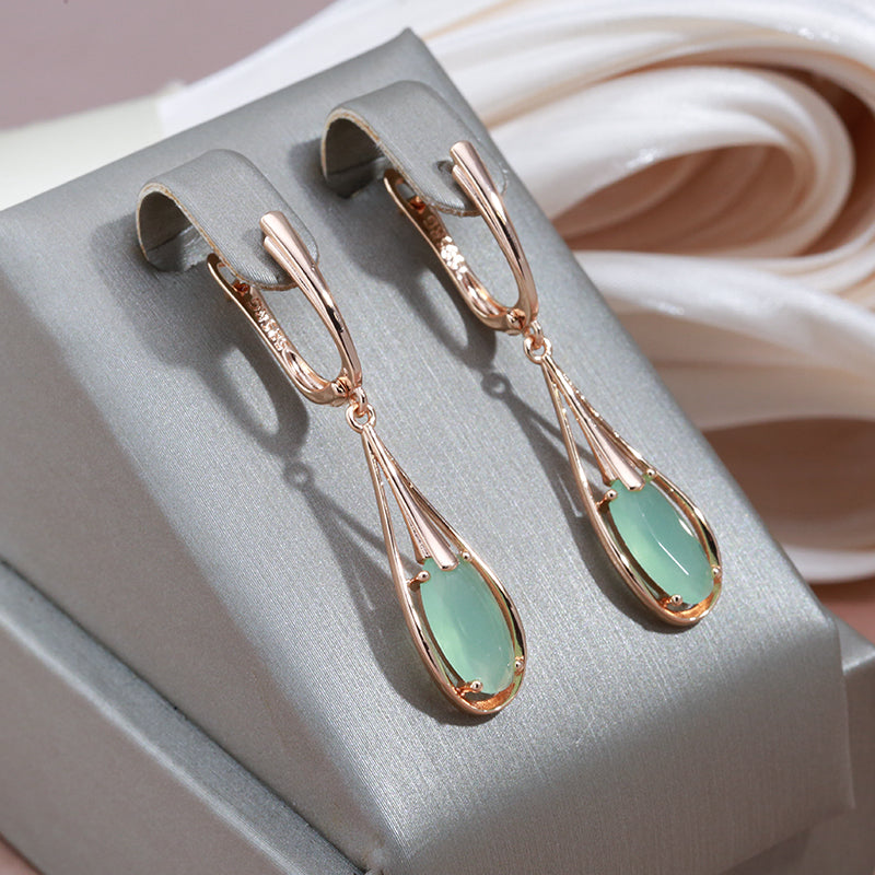 Boucles d'oreilles élégantes en cristal vert en pendentif
