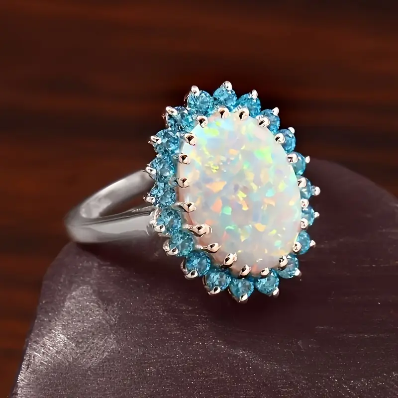 Bague en cristal d'opale blanche bleue
