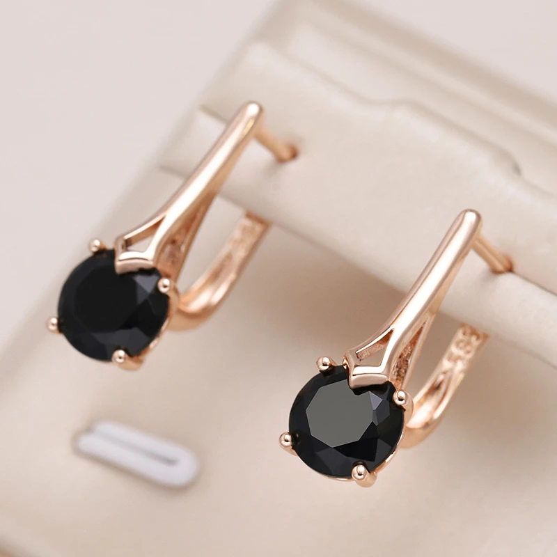 Boucles d'oreilles élégantes avec cristal noir en or