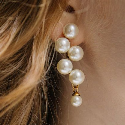 Boucles d'oreilles élégantes en perles pendantes