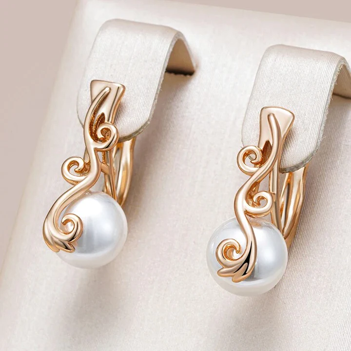 Boucles d'oreilles élégantes en or et perles