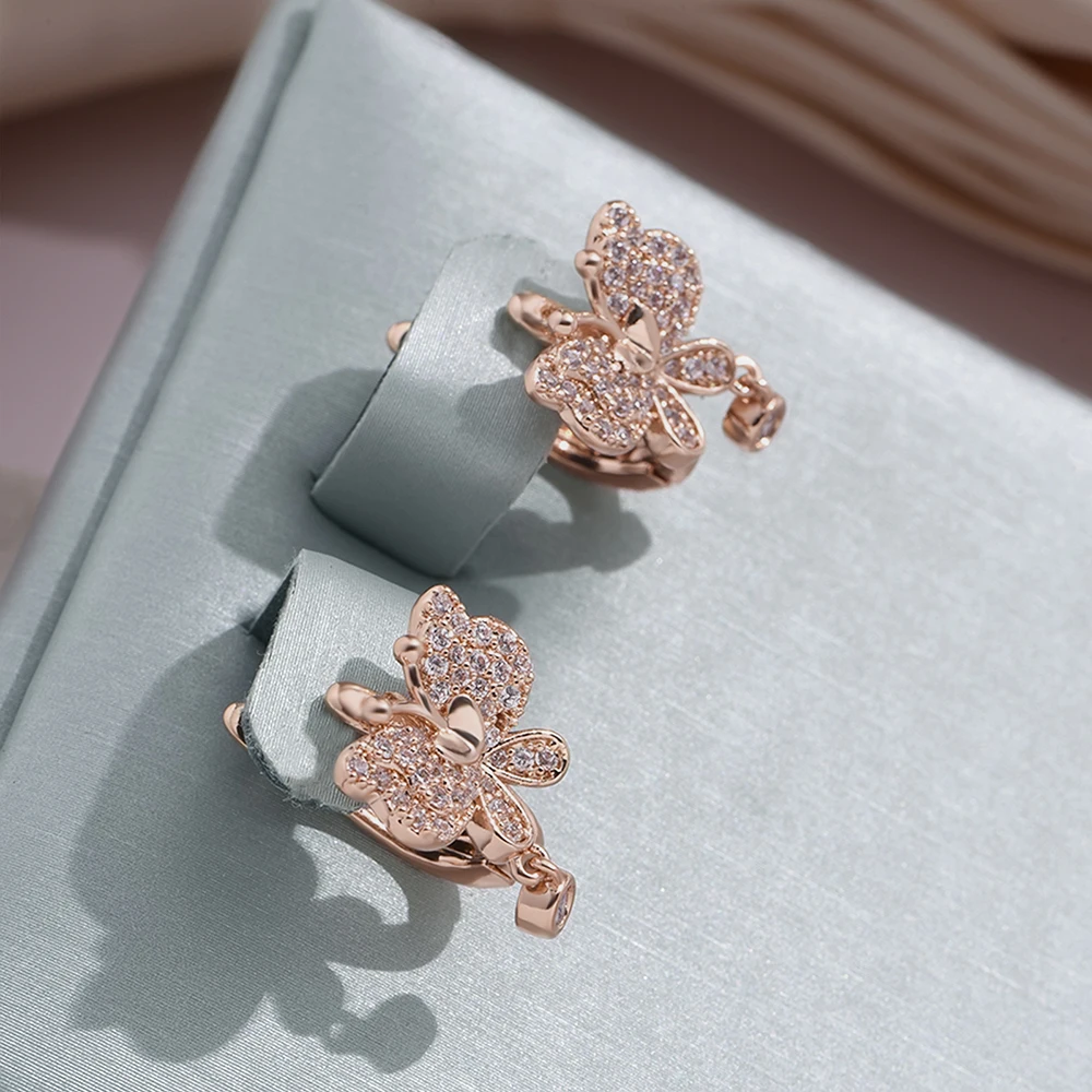 Boucles d'oreilles papillon brillantes et élégantes en or irrégulier