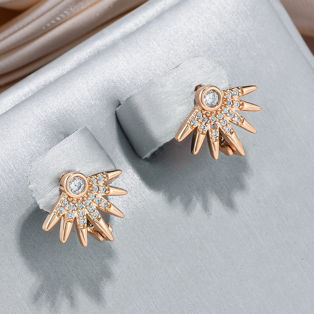 Boucles d'oreilles soleil élégantes en or brillant