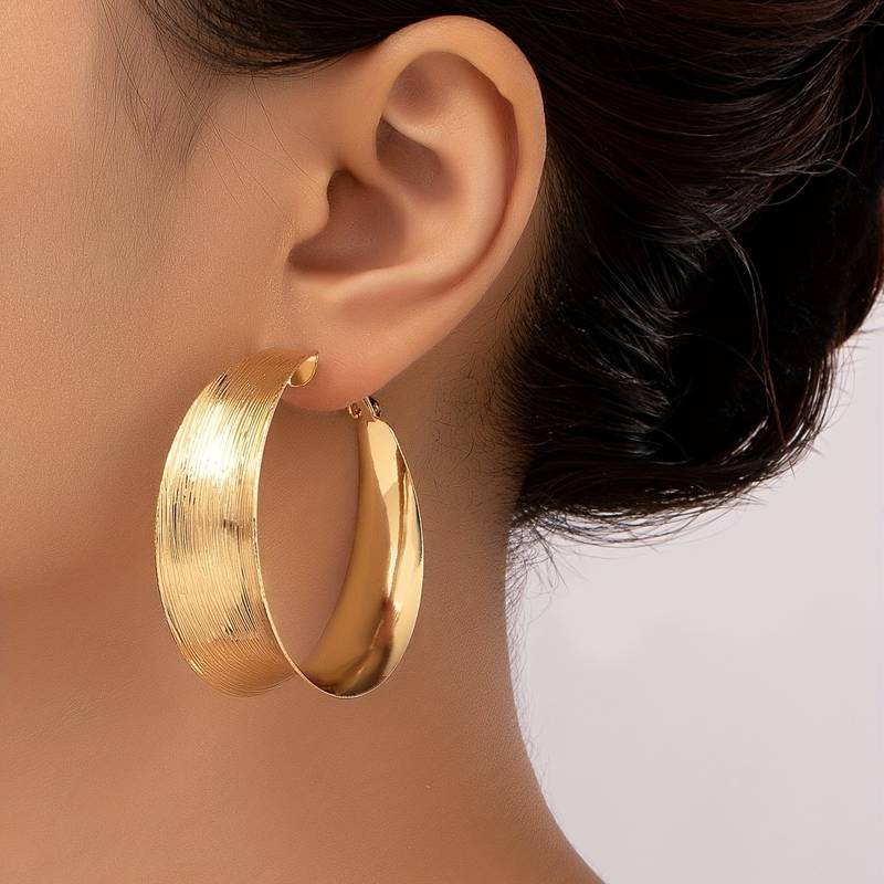 Boucles d'oreilles créoles vieillies en or jaune