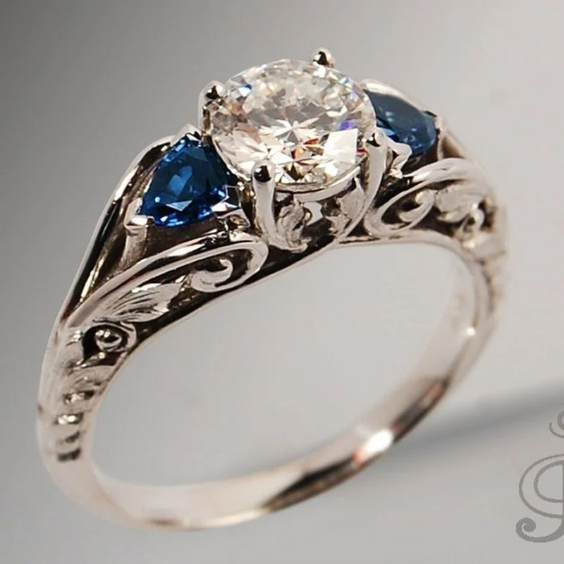 Bague en cristal bleu et blanc vintage