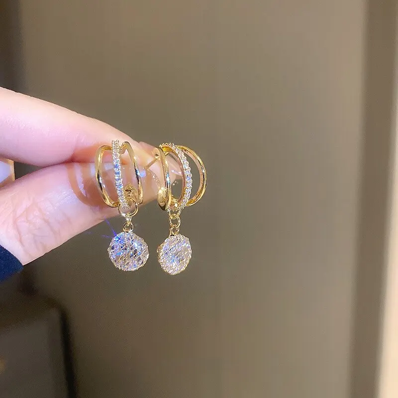 Boucles d'oreilles élégantes en perles lumineuses
