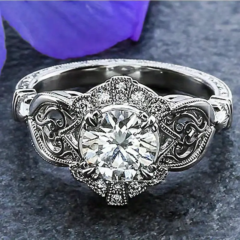 Bague brillante en verre argenté vintage