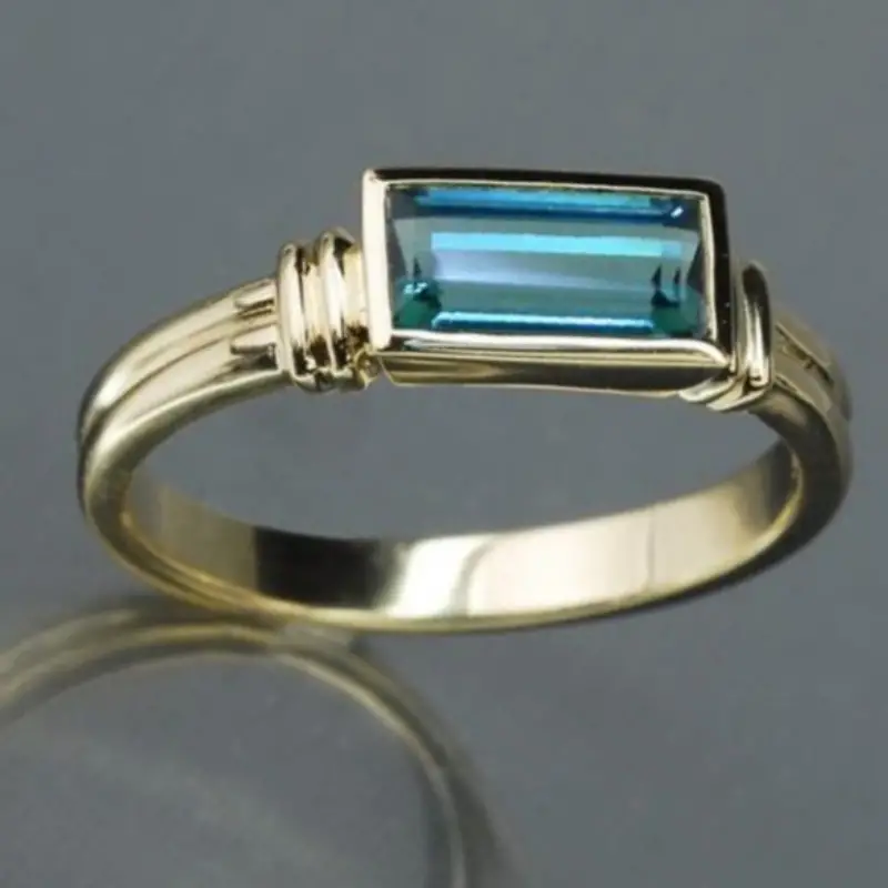 Vintage bague rectangulaire en verre bleu incrusté