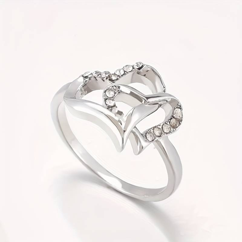 Bague en argent vintage nouée avec zirconias d'amour