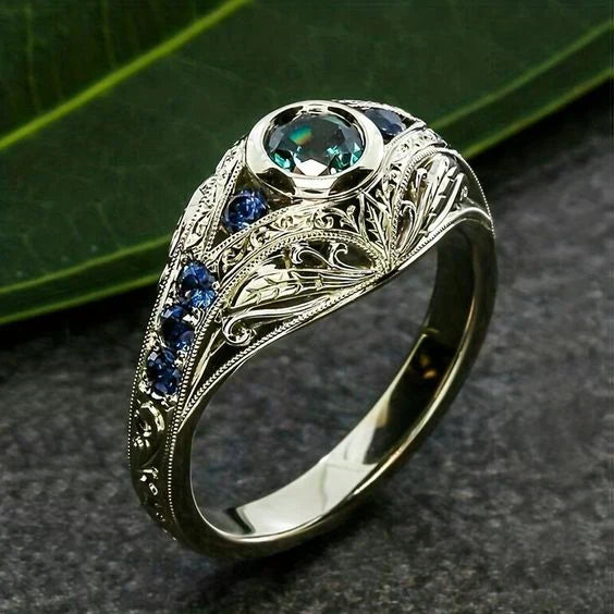 Bague vintage bleue verte argentée brillante