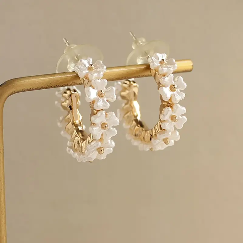 Boucles d'oreilles créoles florales en or