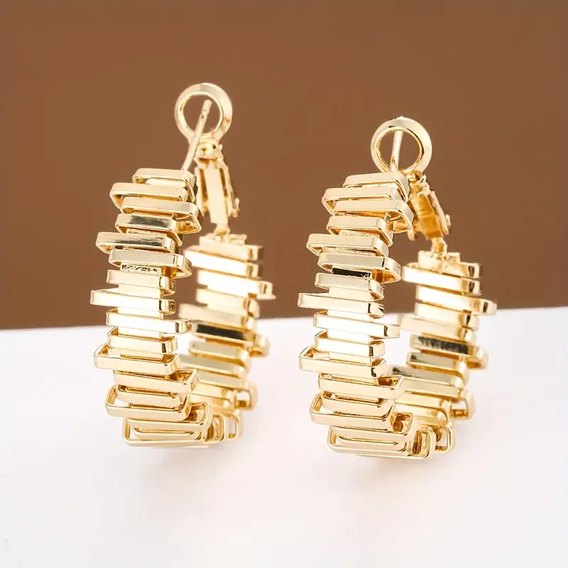 Boucles d'oreilles créoles irrégulières en or