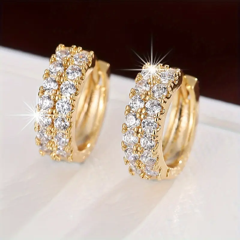 Boucles d'oreilles à clous en or brillant