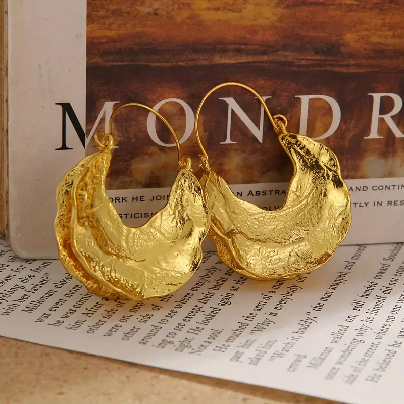 Boucles d'oreilles en argent doré forgé