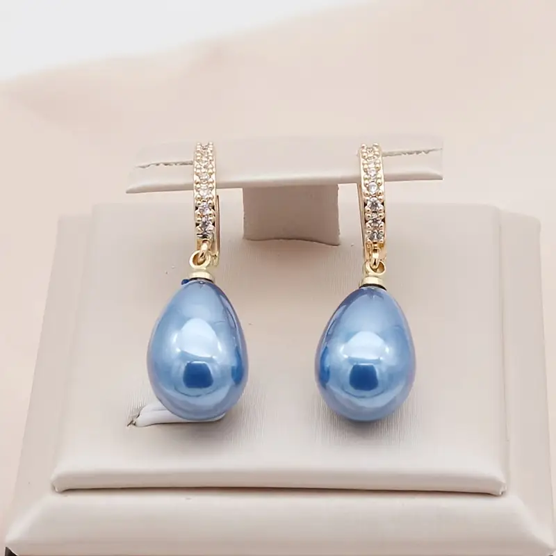 Boucles d'oreilles dormeuses perle bleue