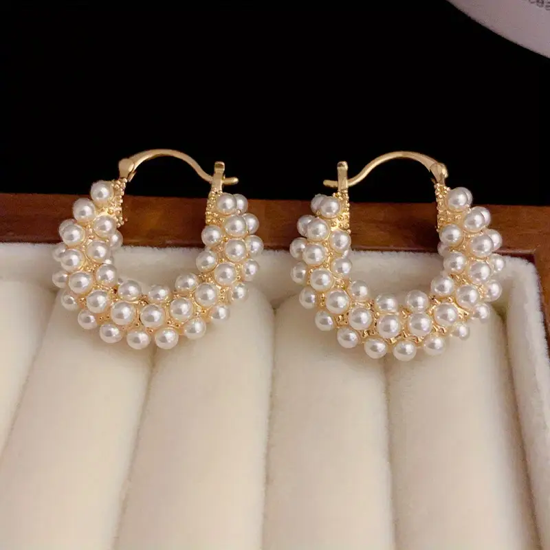 Boucles d'oreilles en or avec panier à perles
