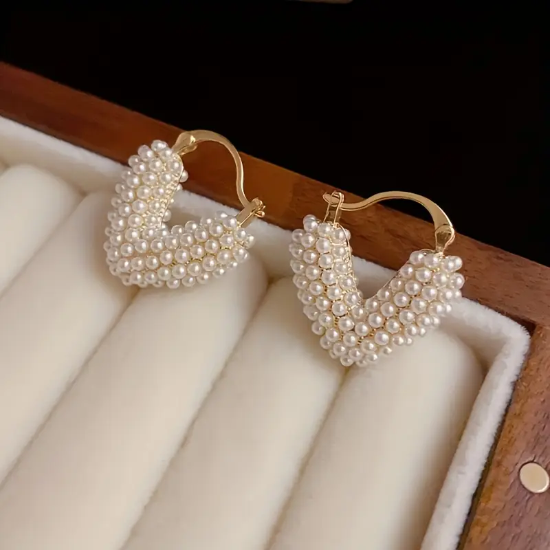 Boucles d'oreilles cœur en or perlé